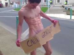 Str8 french guy loses bet, has to stand in traffic naked w/ Free Hugs sign