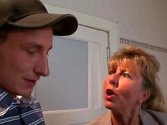 German swinger Petra Wegat in a bathroom threesome