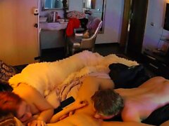 Sexy redhead fucks on a hidden cam on big soft bed