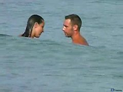 Couple sex on nude beach